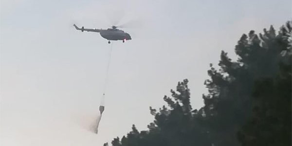 К тушению лесной подстилки под Геленджиком привлекли вертолет Ми-8