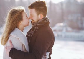 couple in love walking in the winter park